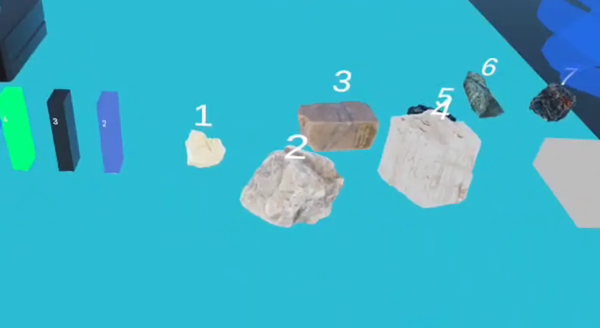 Numbered mineral specimens and hardness-test pieces on the virtual lab table